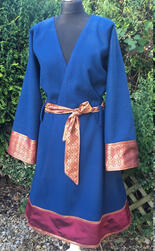 100% wool coat based on historical norse coat patterns, with art silk/brocade trim, lining, and matching belt